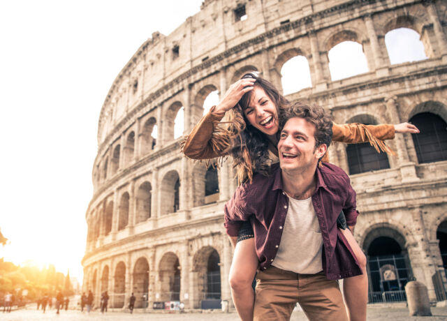 young,couple,at,the,colosseum,,rome, ,happy,tourists,visiting